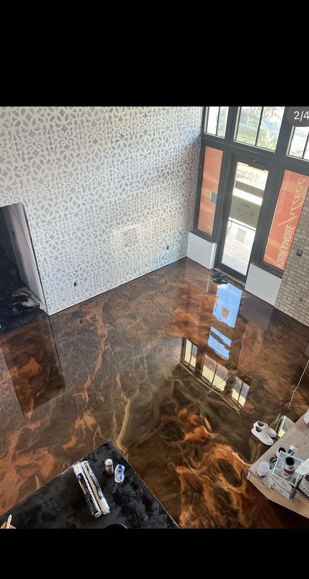 Bronze metallic epoxy floor in a commercial or retail space